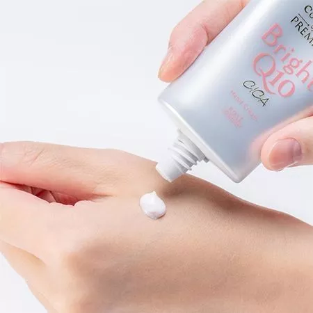 Крем для рук KOSE CoenRich антивозрастной, осветляющий, с защитой от солнца SPF 25 PA++ (60 гр.)